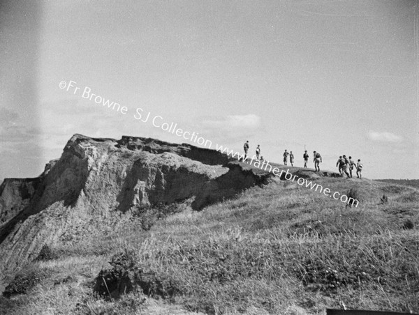 HIKERS ON THE CLIFFS